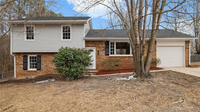 tri-level home featuring a garage