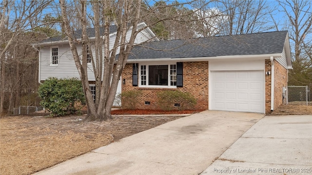 split level home with a garage