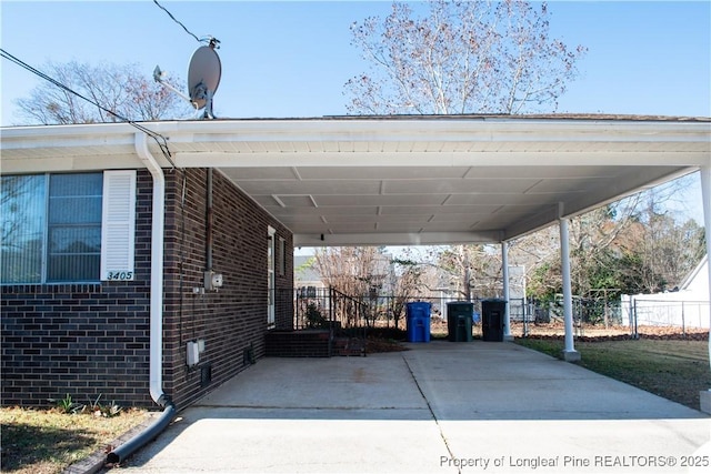 view of parking / parking lot with a carport