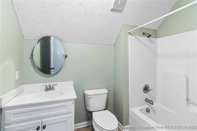 full bathroom with lofted ceiling, vanity, toilet, tub / shower combination, and a textured ceiling