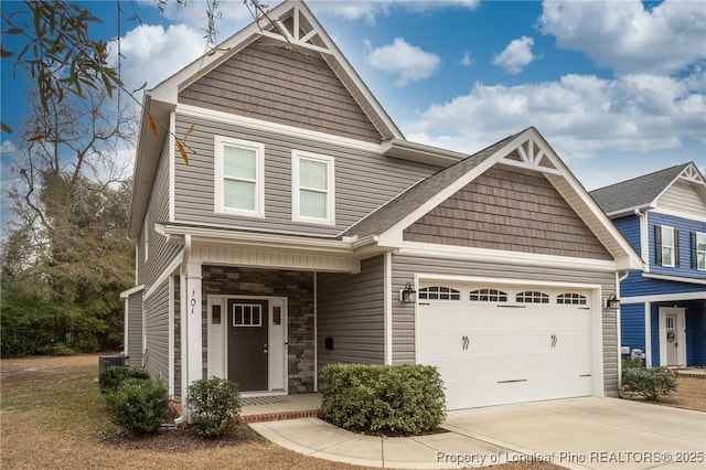 craftsman-style home with a garage