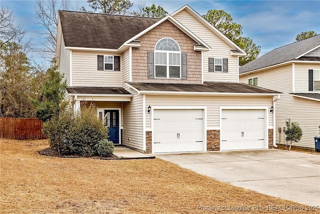 view of front of home with a garage