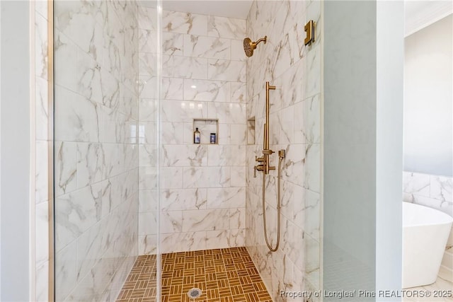 bathroom with separate shower and tub