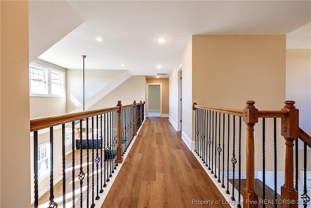 corridor featuring light hardwood / wood-style floors