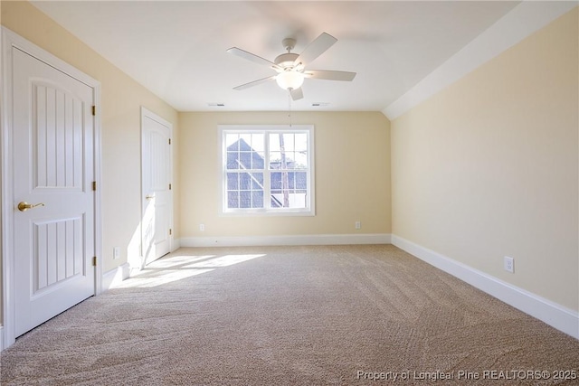 carpeted empty room with ceiling fan