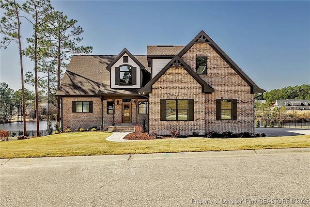 view of front of property with a front lawn