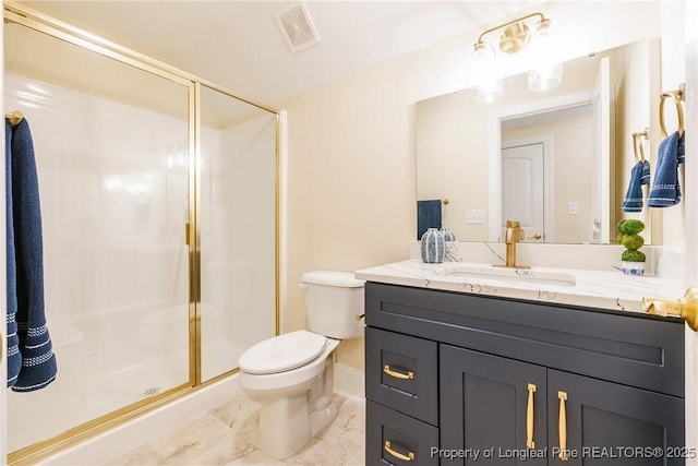 bathroom with vanity, toilet, and walk in shower