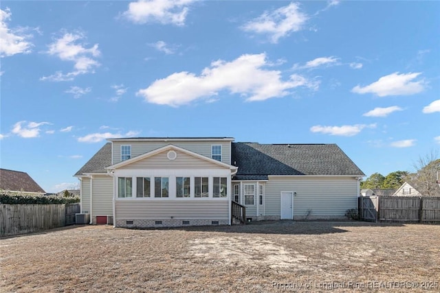 rear view of property with cooling unit