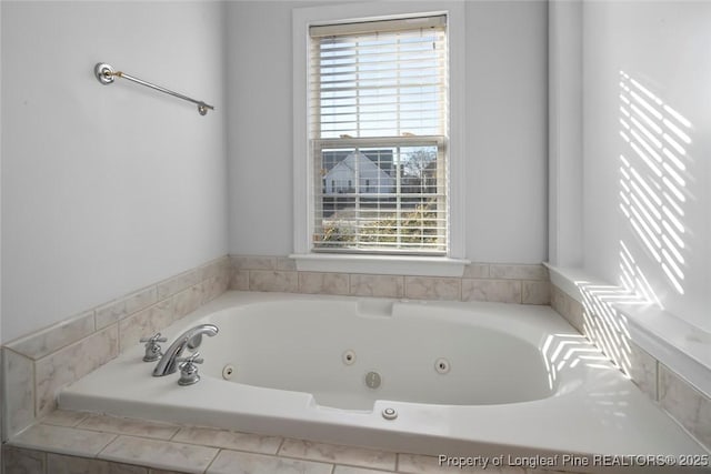 bathroom featuring tiled bath