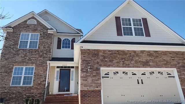 view of front of house with a garage