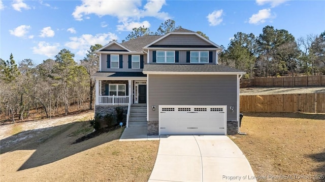 craftsman-style house featuring a garage and a porch