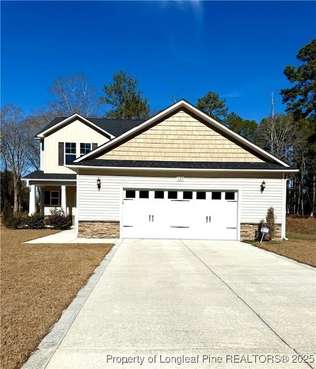 view of front of property featuring a garage