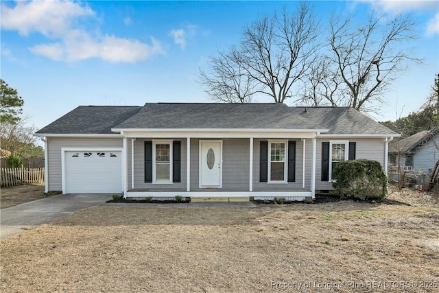 ranch-style home featuring a front lawn, a garage, and a porch