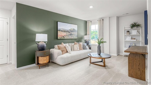 living room with light colored carpet