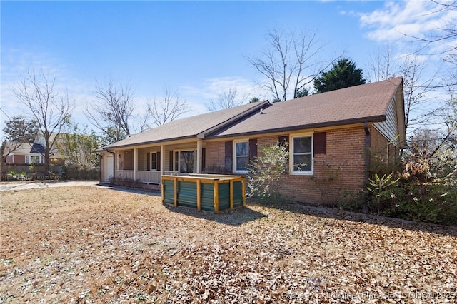 back of property with brick siding