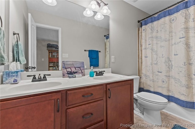 183 Ganton Dr, Raeford, NC 28376 - bathroom with double vanity, toilet, tile patterned floors, and a sink