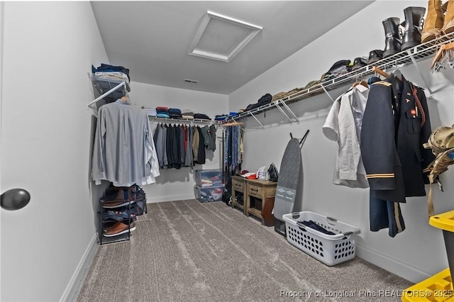 183 Ganton Dr, Raeford, NC 28376 - spacious closet featuring carpet and attic access