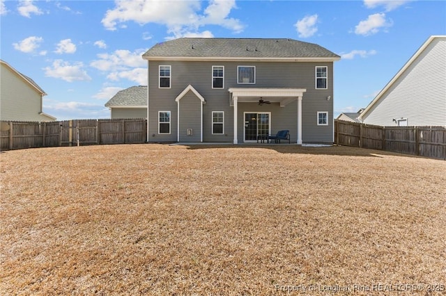 183 Ganton Dr, Raeford, NC 28376 - rear view of house with a yard, a patio, a fenced backyard, and a ceiling fan