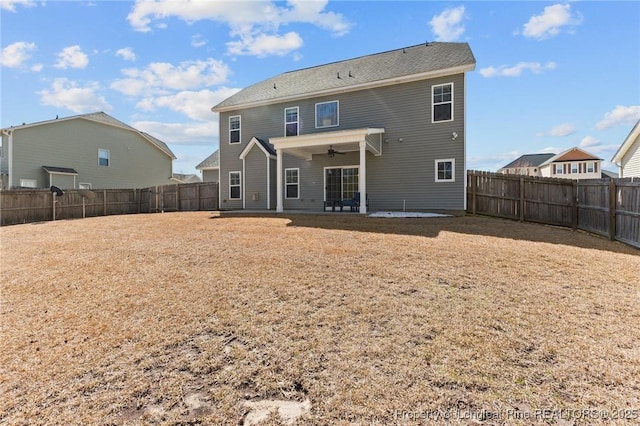 183 Ganton Dr, Raeford, NC 28376 - rear view of property featuring a fenced backyard, a patio area, and ceiling fan