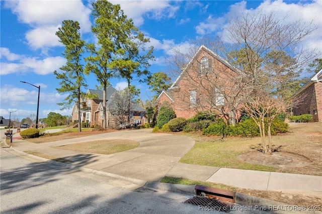 exterior space with curved driveway