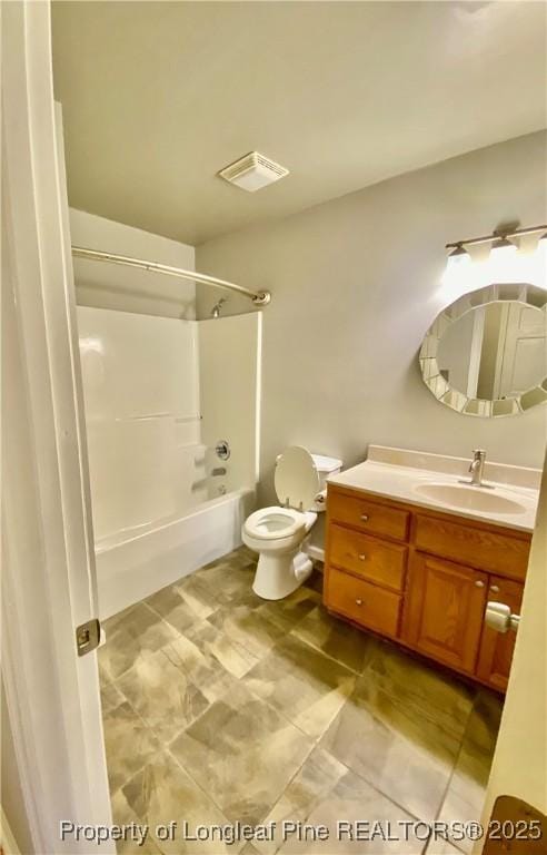 full bathroom featuring visible vents, vanity, shower / bathtub combination, toilet, and tile patterned floors