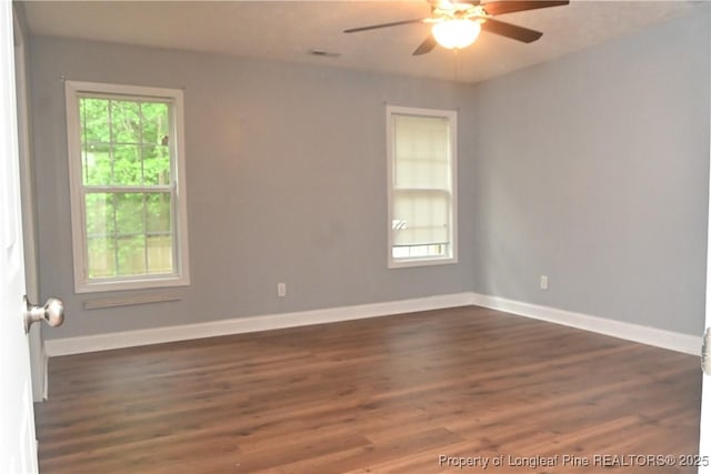 279 Hunters Creek Dr, Raeford, NC 28376 - empty room with ceiling fan, dark wood-style flooring, and baseboards