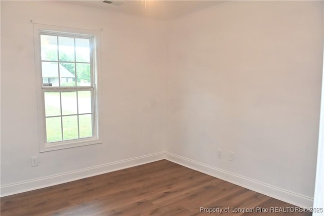 279 Hunters Creek Dr, Raeford, NC 28376 - empty room with baseboards and dark wood-style flooring