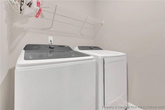 5145 Maxwell Rd, Stedman, NC 28391 - laundry area featuring washing machine and clothes dryer