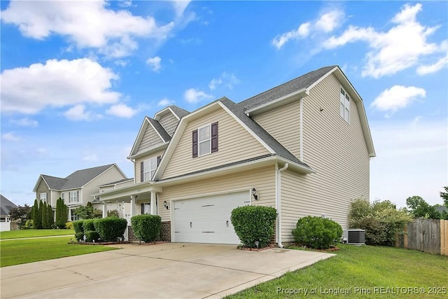 153 Dairy Ct, Raeford, NC 28376 - view of front facade featuring driveway and a garage