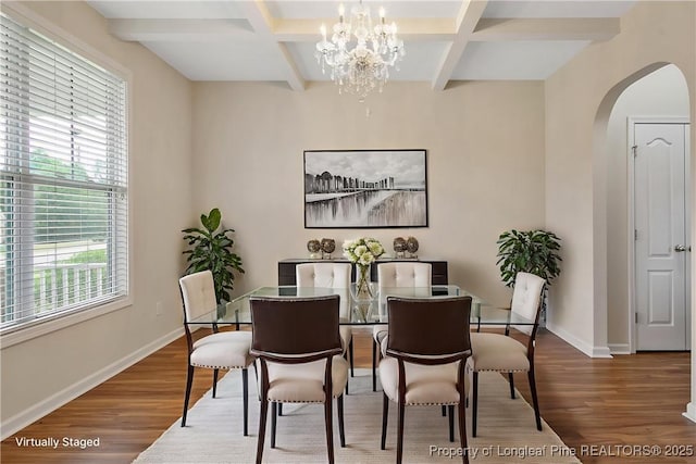 153 Dairy Ct, Raeford, NC 28376 - dining room with wood finished floors, arched walkways, coffered ceiling, beamed ceiling, and a chandelier