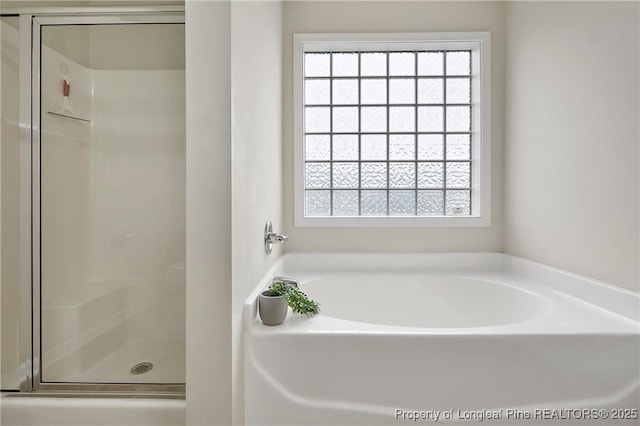 153 Dairy Ct, Raeford, NC 28376 - full bathroom with a garden tub and a shower stall