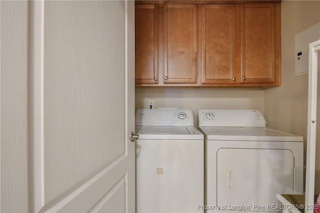 159 Gallery Dr Unit 103, Spring Lake, NC 28390 - washroom with washing machine and clothes dryer and cabinet space