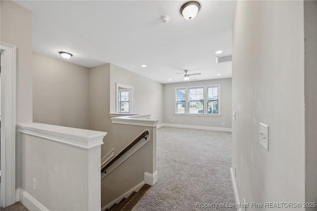 405 Gilpin Way, Cary, NC 27519 - hall with an upstairs landing, dark carpet, baseboards, and recessed lighting