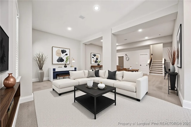 405 Gilpin Way, Cary, NC 27519 - living room featuring carpet flooring, stairs, baseboards, and recessed lighting