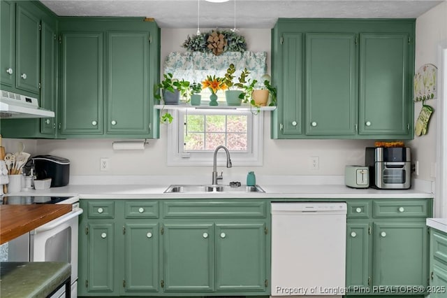 1963 Seabrook School Rd, Fayetteville, NC 28312 - kitchen featuring white appliances, under cabinet range hood, a sink, and light countertops