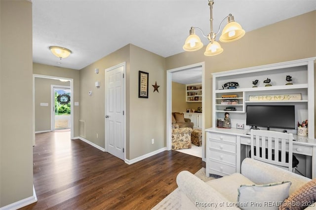 office with wood finished floors, a chandelier, and baseboards