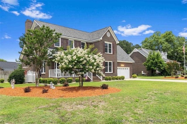 view of front of property with a garage, a front lawn, brick siding, concrete driveway, and a chimney