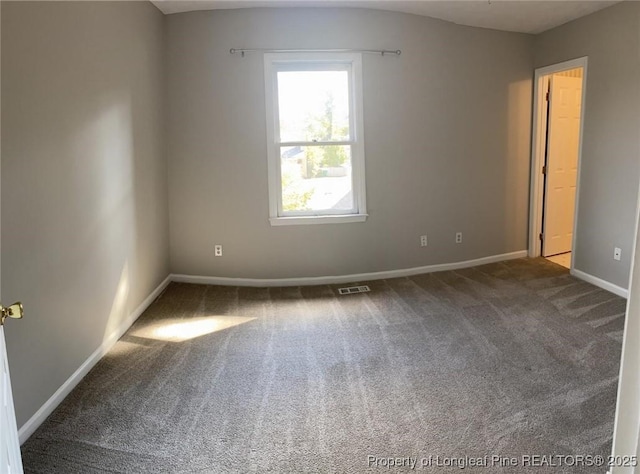 5566 Robmont Dr, Fayetteville, NC 28306 - unfurnished room with carpet floors and baseboards