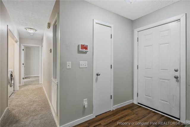 303 Whipple Tree Ln, Fayetteville, NC 28314 - hall with a textured ceiling, washer / dryer, and wood finished floors
