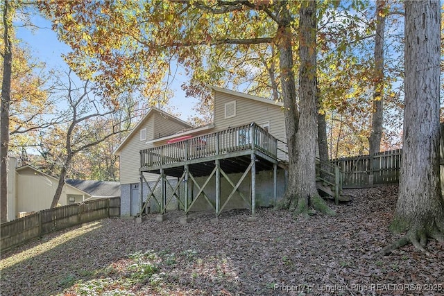 303 Whipple Tree Ln, Fayetteville, NC 28314 - back of property with a wooden deck and a fenced backyard