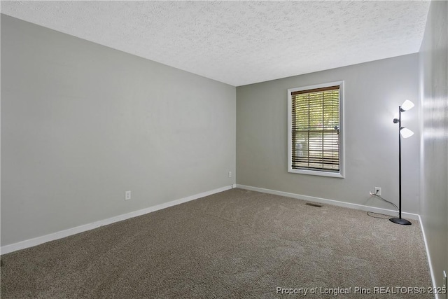 303 Whipple Tree Ln, Fayetteville, NC 28314 - empty room featuring carpet flooring and a textured ceiling