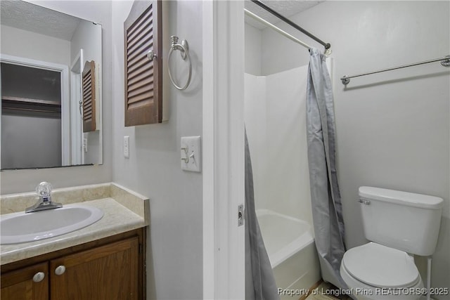 303 Whipple Tree Ln, Fayetteville, NC 28314 - bathroom featuring vanity, shower / tub combo with curtain, and a textured ceiling