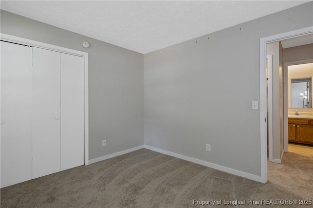 303 Whipple Tree Ln, Fayetteville, NC 28314 - unfurnished bedroom with light carpet and a closet