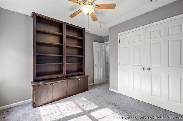7616 Spurge Dr, Fayetteville, NC 28311 - unfurnished bedroom with light carpet, ceiling fan, and a closet