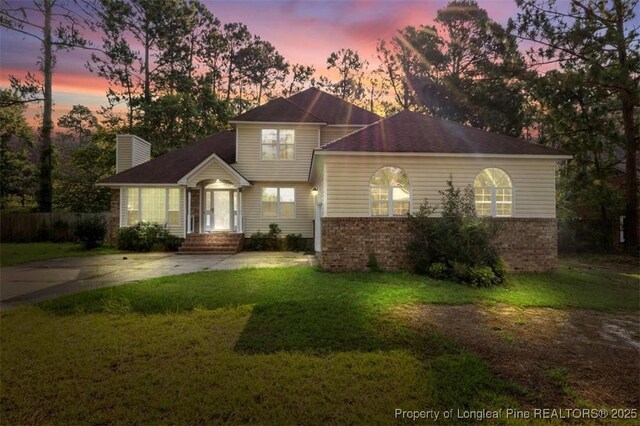 7616 Spurge Dr, Fayetteville, NC 28311 - view of front of property with brick siding and a chimney