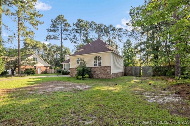 7616 Spurge Dr, Fayetteville, NC 28311 - view of side of property featuring brick siding