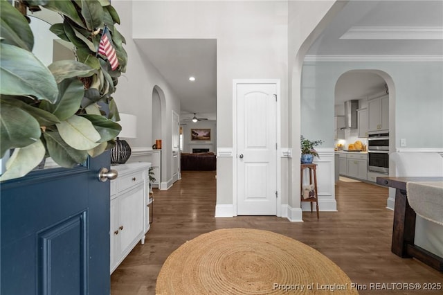500 Legacy Lakes Way, Aberdeen, NC 28315 - entryway with arched walkways, ornamental molding, dark wood-style floors, a ceiling fan, and recessed lighting