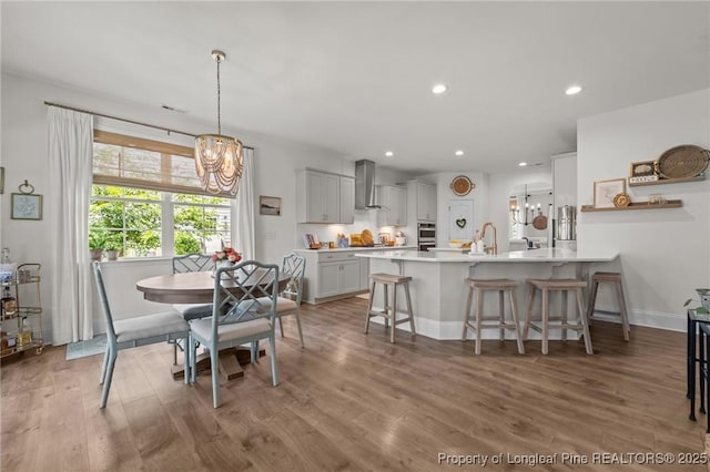 500 Legacy Lakes Way, Aberdeen, NC 28315 - dining room with a chandelier, recessed lighting, and light wood-style flooring