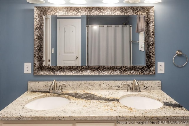full bath with double vanity and a shower with curtain