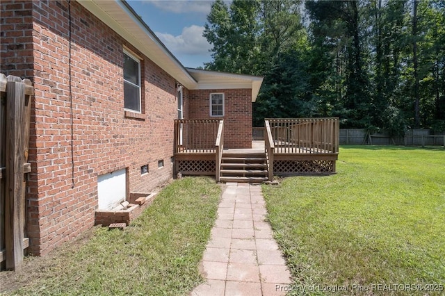 view of yard with a wooden deck